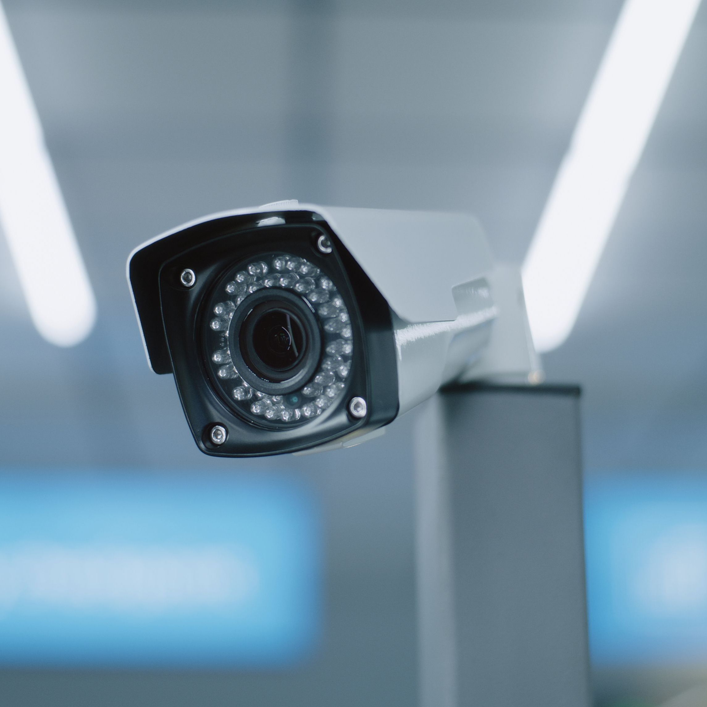 Close Up of Installed CCTV Camera. Professional Video Surveillance System in Modern Airport Terminal